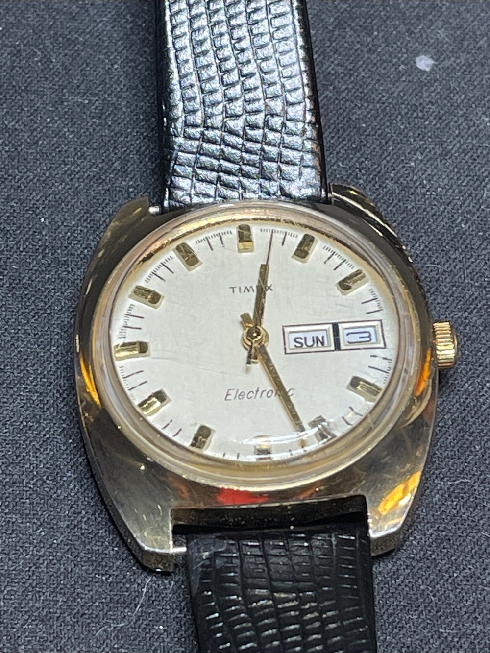 Timex Gold Tone Watch with Black Strap and White Dial